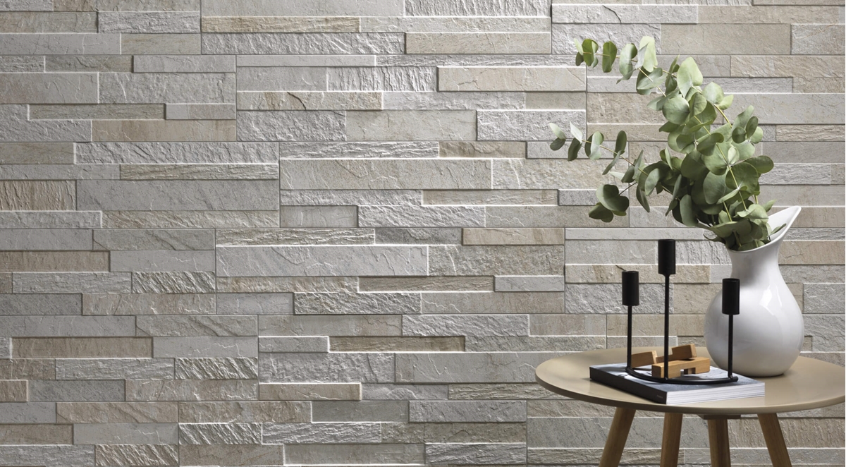 Parement effet pierre naturelle en carrelage, série Cubics, nuances de blanc