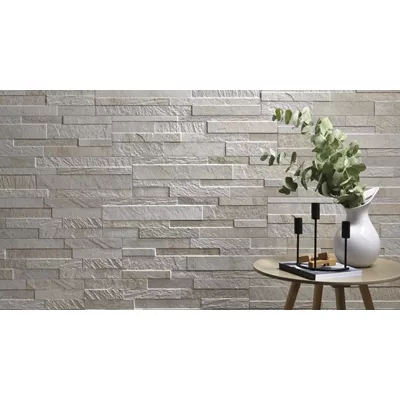 Parement effet pierre naturelle en carrelage, série Cubics, nuances de blanc